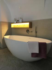 Kúpeľňa v ubytovaní Apartment Der Riese + 15 fotografií