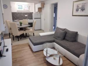 Kuchyň nebo kuchyňský kout v ubytování Apartman Ivano
