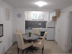 Kuchyň nebo kuchyňský kout v ubytování Apartman Ivano + 3 fotografie