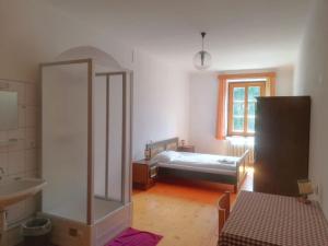Letto o letti in una camera di Gasthof Elisabeth