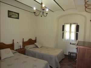 Postel nebo postele na pokoji v ubytování Cortijo "Era Grande 1" + 37 fotografií