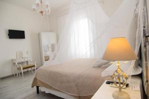 Voodi või voodid majutusasutuse B&B 7 Rooms toas