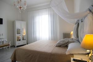 Voodi või voodid majutusasutuse B&B 7 Rooms toas