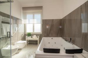 Kúpeľňa v ubytovaní LA DOLCE VITA ROOMS