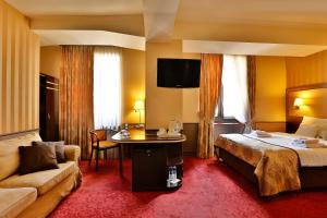 Posteľ alebo postele v izbe v ubytovaní Hotel Wielopole