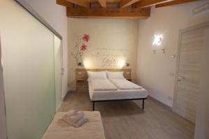 Postel nebo postele na pokoji v ubytování B&B da Sabry e Gian