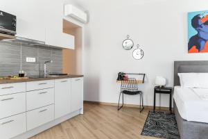 Kuchyň nebo kuchyňský kout v ubytování Dolac apartments