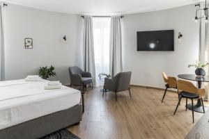 Postel nebo postele na pokoji v ubytování Dolac apartments