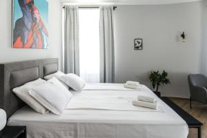 Postel nebo postele na pokoji v ubytování Dolac apartments