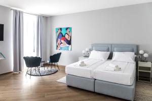 Postel nebo postele na pokoji v ubytování Dolac apartments