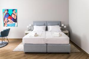 Postel nebo postele na pokoji v ubytování Dolac apartments