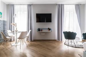 TV a/nebo společenská místnost v ubytování Dolac apartments