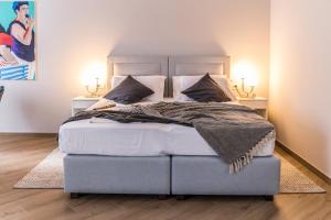 Postel nebo postele na pokoji v ubytování Dolac apartments