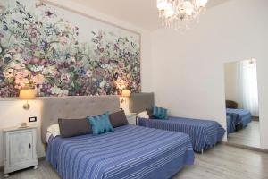 Voodi või voodid majutusasutuse B&B 7 Rooms toas