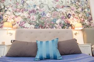 Voodi või voodid majutusasutuse B&B 7 Rooms toas