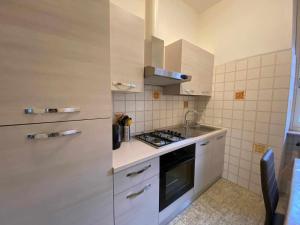 Kuchyň nebo kuchyňský kout v ubytování Casa Vacanza Amelia