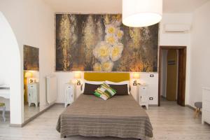 Voodi või voodid majutusasutuse B&B 7 Rooms toas