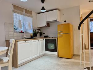 Kuchyň nebo kuchyňský kout v ubytování Apartman Ivano Cres