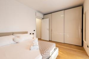 Posteľ alebo postele v izbe v ubytovaní Navigli Stylish Home