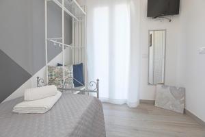 Posteľ alebo postele v izbe v ubytovaní La casa di Vittoria