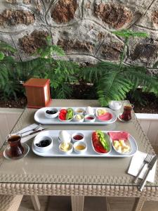 a tray of food on top of a table at White Island Boutique Otel in Adalar
