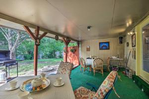 a room with a table and chairs and a dining room at Unique Vintage Hideaway Less Than 6 Miles to Lackland AFB! in San Antonio