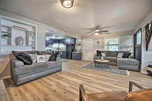 a living room with two couches and a table at Stylish Warsaw Home with Fire Pit and Lake Access in Warsaw