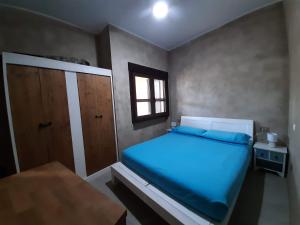 A bed or beds in a room at Villa Michela