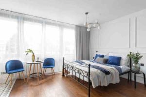 Posteľ alebo postele v izbe v ubytovaní Apartament Warszawa Centrum-blisko Starego Miasta
