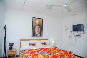 Voodi või voodid majutusasutuse The Ad Lib Executive lodge toas