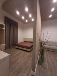 Postel nebo postele na pokoji v ubytování B&B LEI