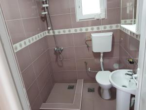 Bilik mandi di Apartmani Vila Ebra