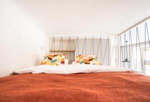 Posteľ alebo postele v izbe v ubytovaní oompH Warsaw Central Premium Apartments