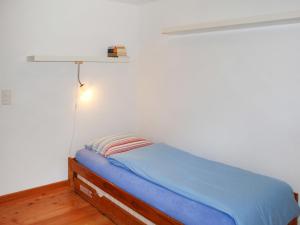 Postel nebo postele na pokoji v ubytování Holiday Home Rustico Enrico by Interhome