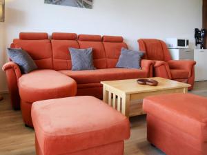 a living room with a couch and two chairs and a table at Apartment Derborence 28 by Interhome in Nendaz