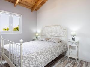 En eller flere senge i et værelse på Holiday Home Jorge by Interhome