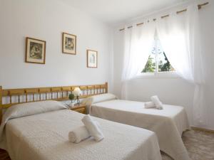 Posteľ alebo postele v izbe v ubytovaní Villa Gardenia by Interhome + 32 fotografií
