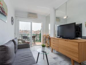 Televízia a/alebo spoločenská miestnosť v ubytovaní Apartment Port Ducal-3 by Interhome