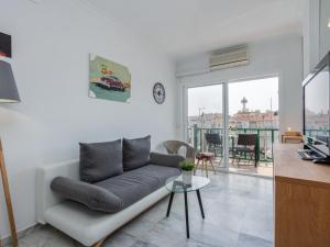 Televízia a/alebo spoločenská miestnosť v ubytovaní Apartment Port Ducal-3 by Interhome