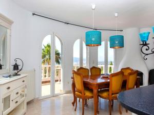 a dining room with a table and chairs at Villa Mona Lisa by Interhome in Altea