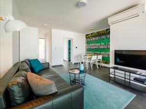 TV a/nebo společenská místnost v ubytování Apartment Fűzfő by Interhome