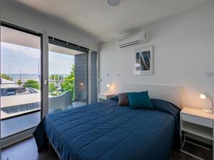 Postel nebo postele na pokoji v ubytování Apartment Fűzfő by Interhome