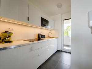 Kuchyň nebo kuchyňský kout v ubytování Apartment Fűzfő by Interhome