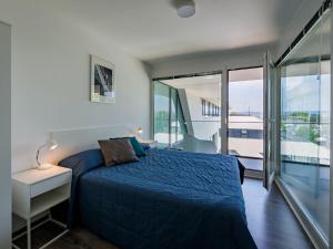 Postel nebo postele na pokoji v ubytování Apartment Fűzfő by Interhome