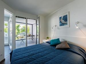 Posteľ alebo postele v izbe v ubytovaní Apartment Fenyves by Interhome