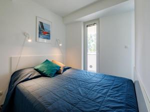 Posteľ alebo postele v izbe v ubytovaní Apartment Fenyves by Interhome