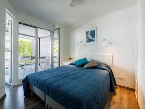 Posteľ alebo postele v izbe v ubytovaní Apartment Fenyves by Interhome