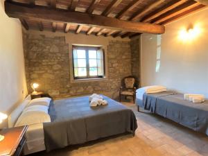 A bed or beds in a room at Apartment Libertas by Interhome
