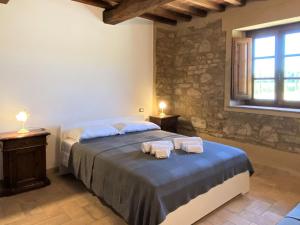 A bed or beds in a room at Apartment Libertas by Interhome