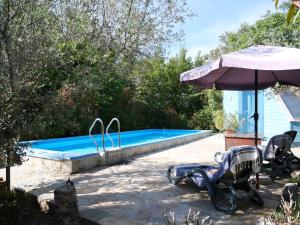 Bazén v ubytovaní Holiday Home Fiore by Interhome alebo v jeho blízkosti